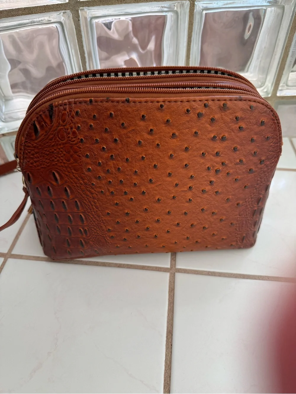 Women's Brown Crossbody Bag with Crock Print & Tassel Zip Pocket